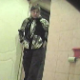 A hidden camera captures video footage of three women shitting into a toilet in an Eastern-European bathroom.